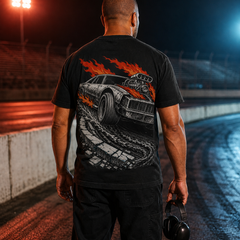 Model wearing Redline Furnace back print at a floodlit short-track pit wall