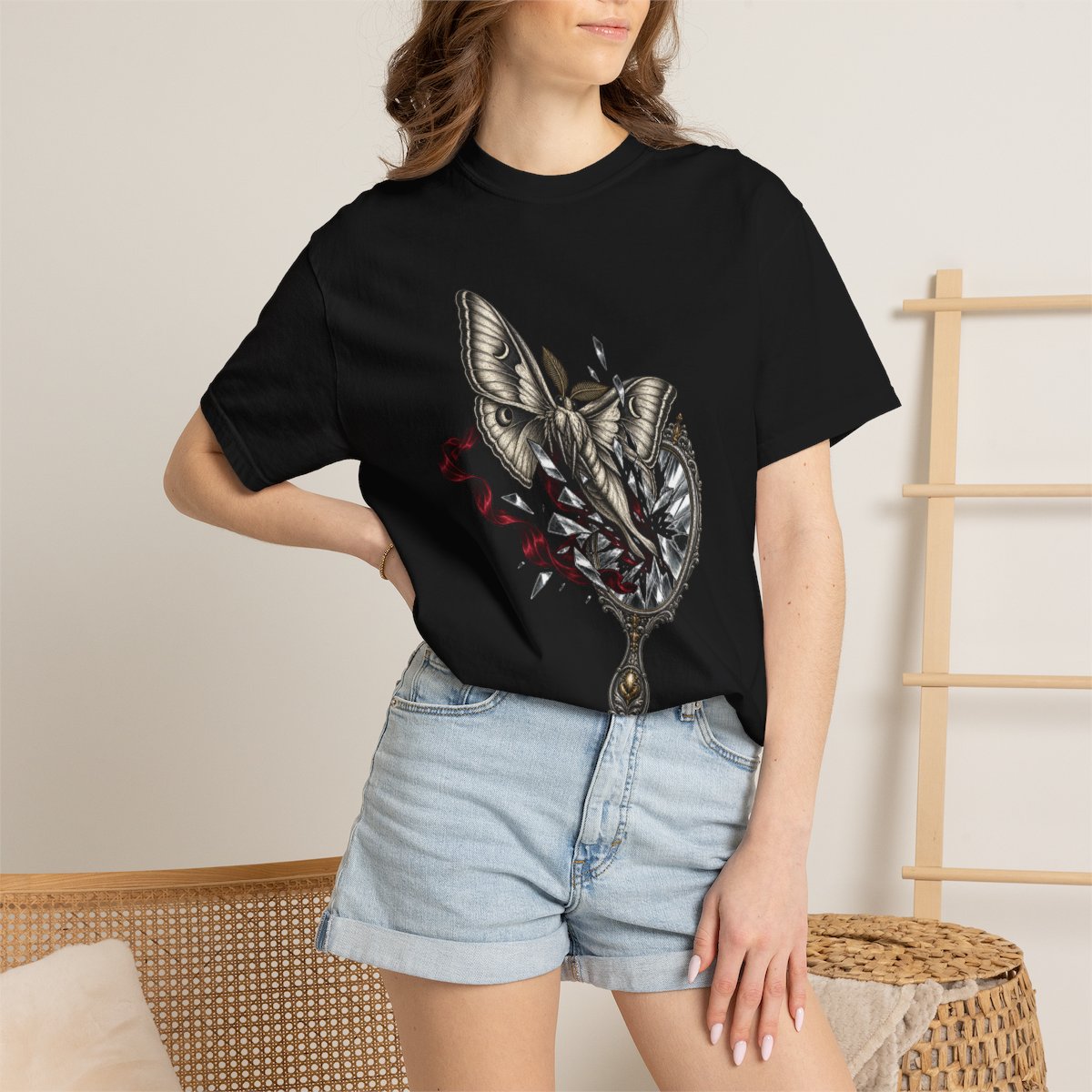 Moth Through Glass Tee worn Printify context view on a Black Comfort Colors 1717 tee