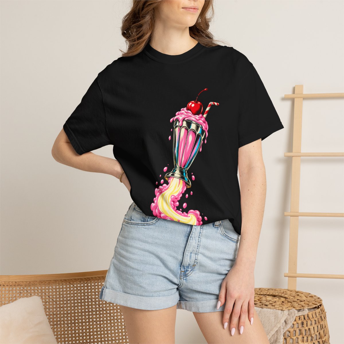 Milkshake Liftoff Tee worn Printify context view on a Black Comfort Colors 1717 tee