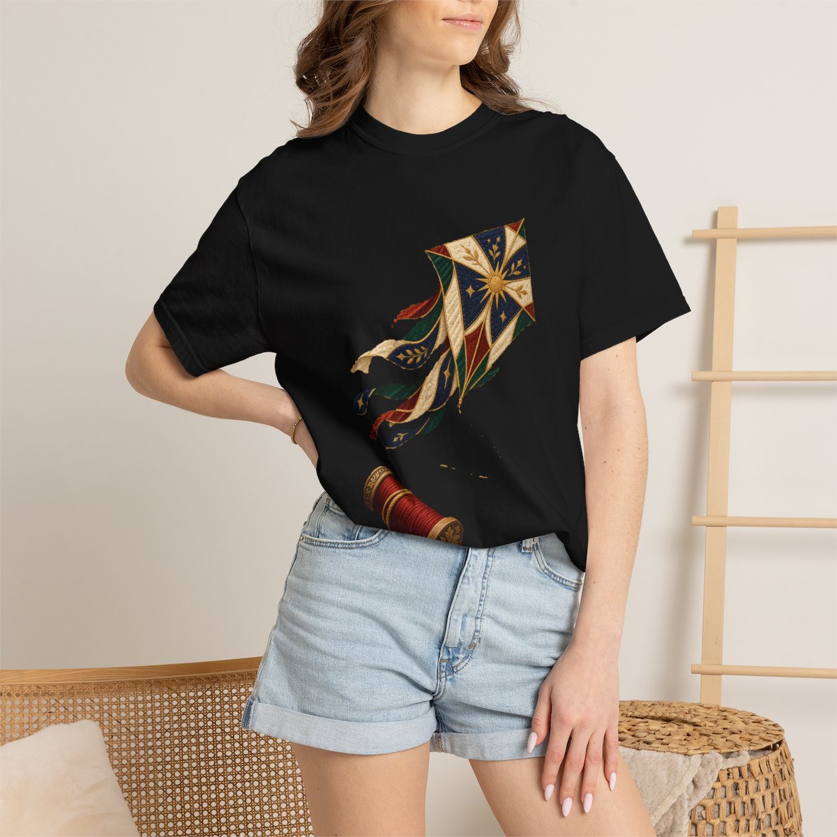 Kite Cuts Loose Tee worn Printify context view on a Black Comfort Colors 1717 tee