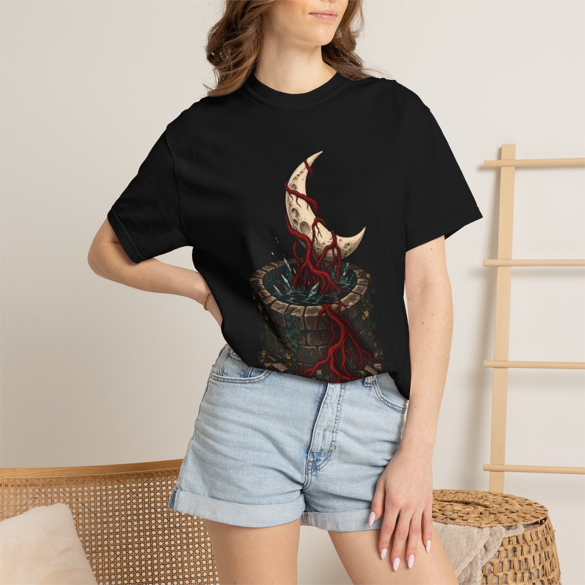 Moon Well Tee worn Printify context view on a Black Comfort Colors 1717 tee