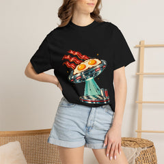 Breakfast Takes Flight Tee worn Printify context view on a Black Comfort Colors 1717 tee