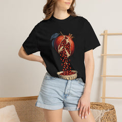 Pomegranate Spill Tee worn Printify context view on a Black Comfort Colors 1717 tee