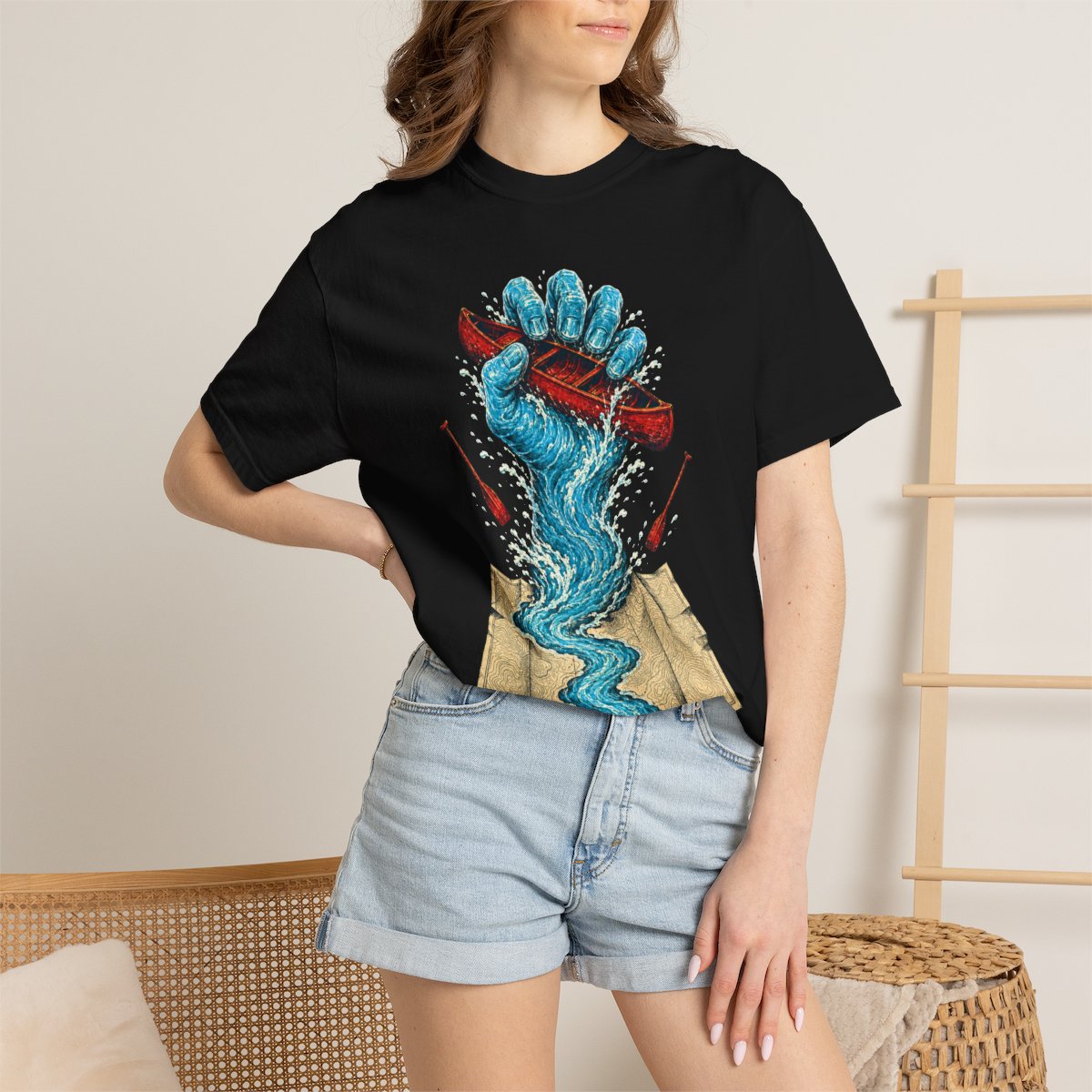 River Takes Its Toll Canoe Hand Front Print Tee worn Printify context view on a Black Comfort Colors 1717 tee