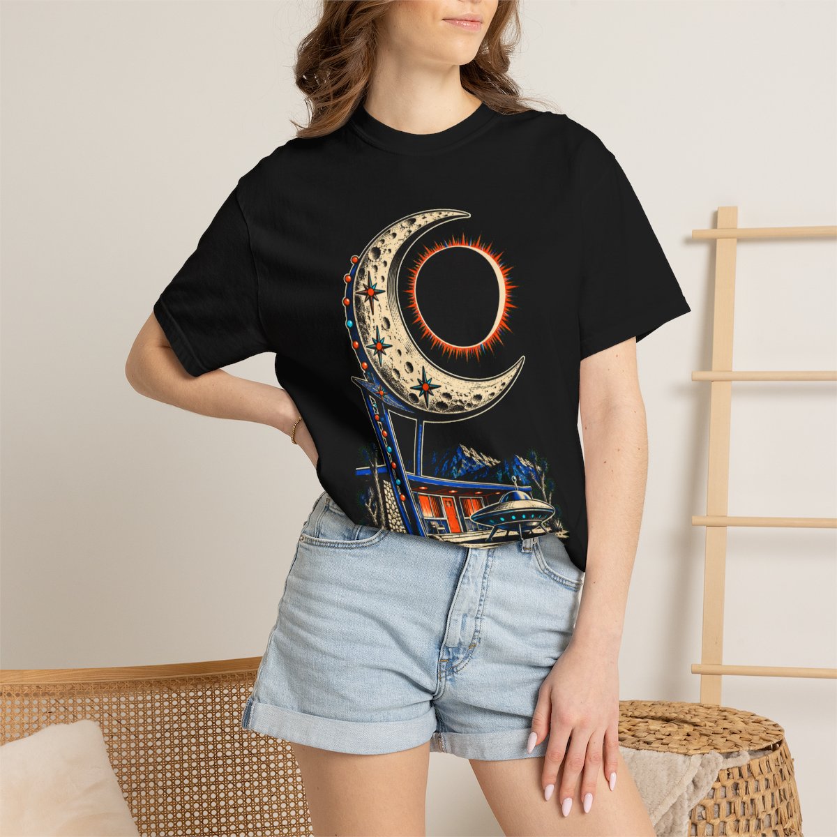 Eclipse Motel Front Print Tee worn Printify context view on a Black Comfort Colors 1717 tee